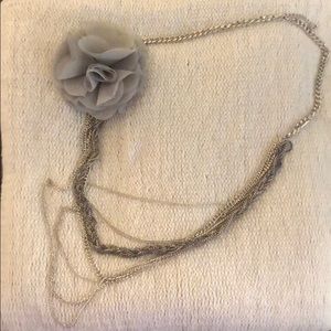 Silver necklace with gray flower